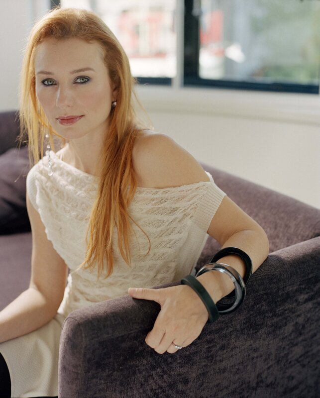 woman in white lace top
