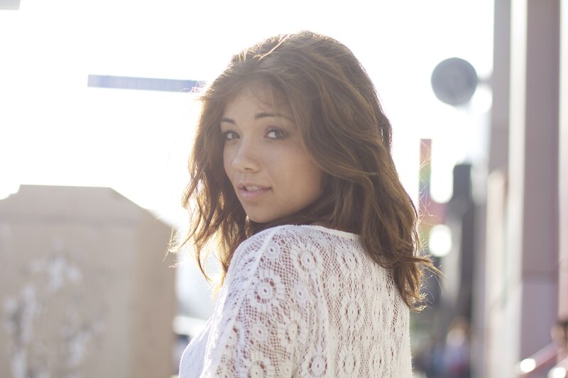 woman in white lace top