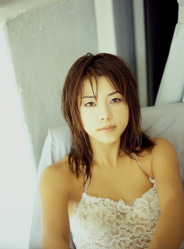 woman in white lace top