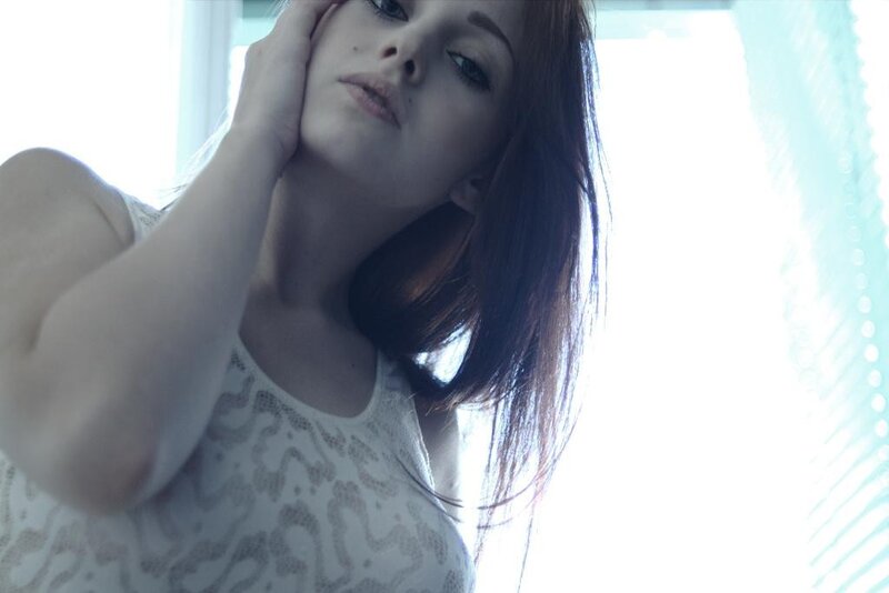 woman in white lace top