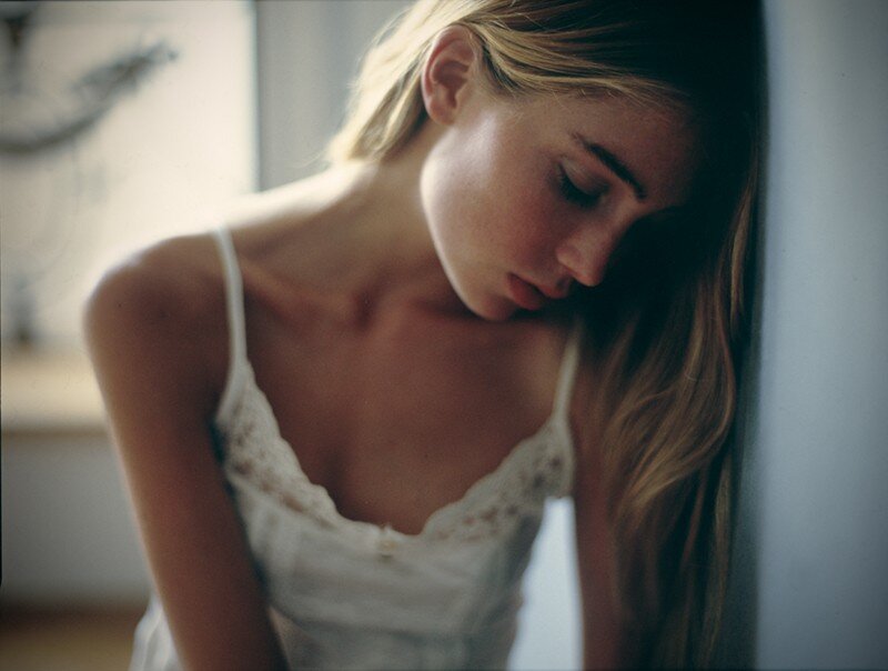 woman in white lace top