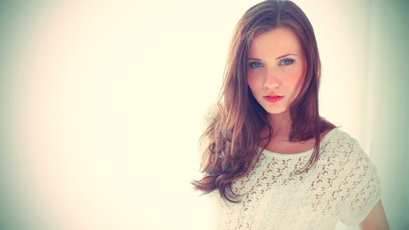 woman in white lace top