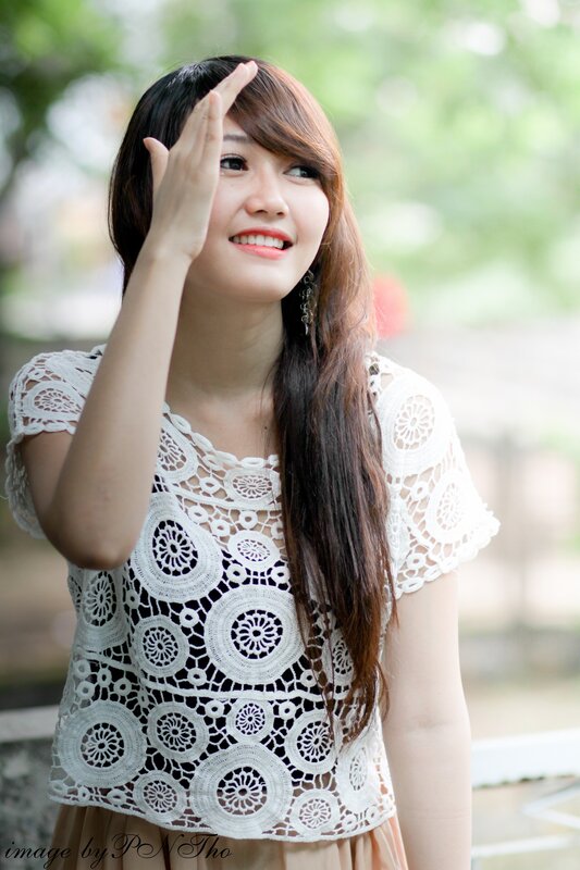 woman in white lace top