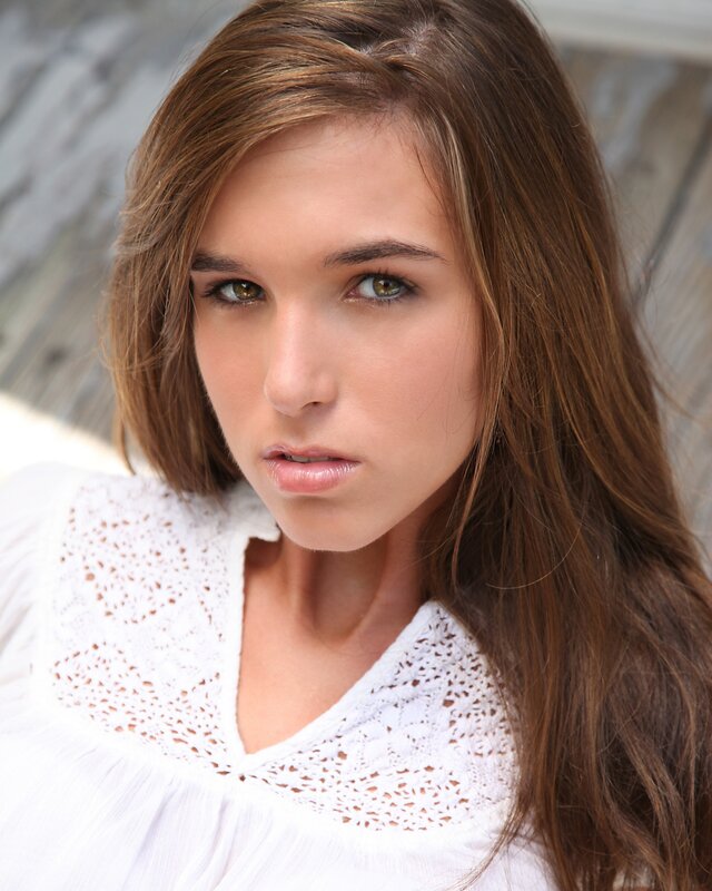 woman in white lace top