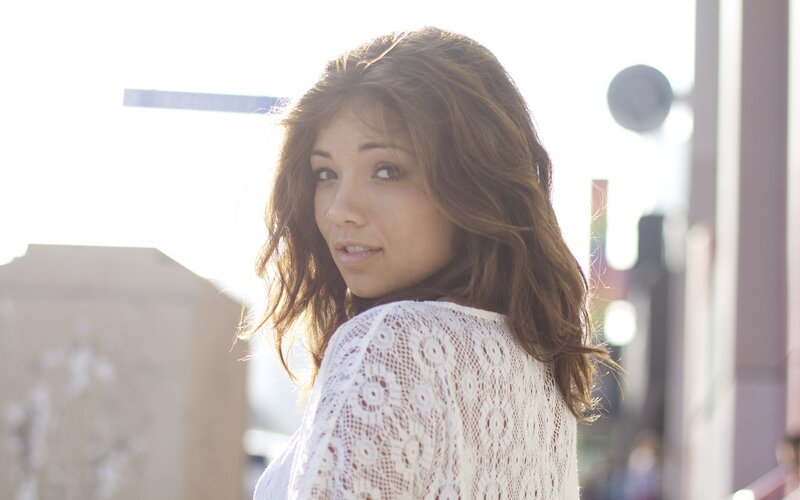 woman in white lace top