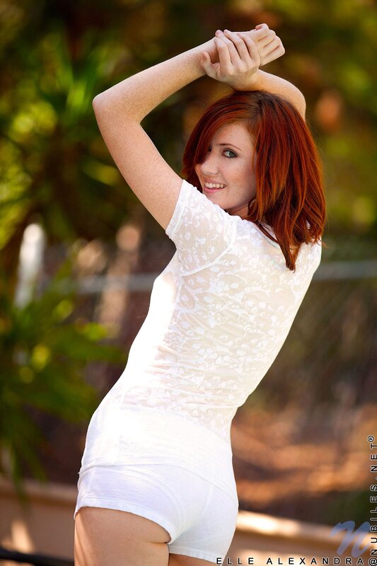 Woman in white lace top