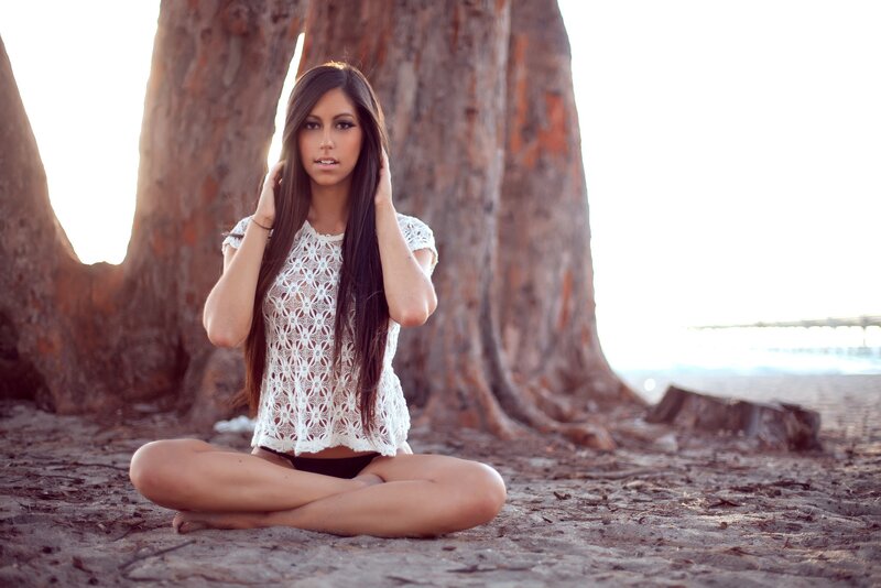 woman in white lace top