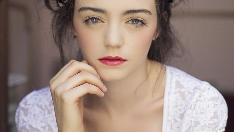 woman in white lace top