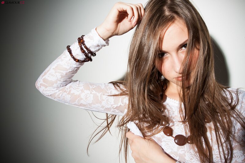 woman in white lace top