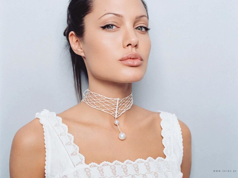 woman in white lace top