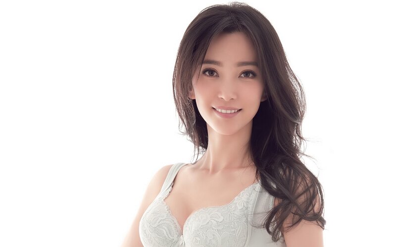 woman in white lace top