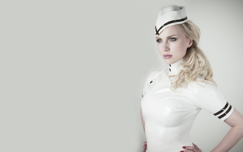 woman in white latex uniform