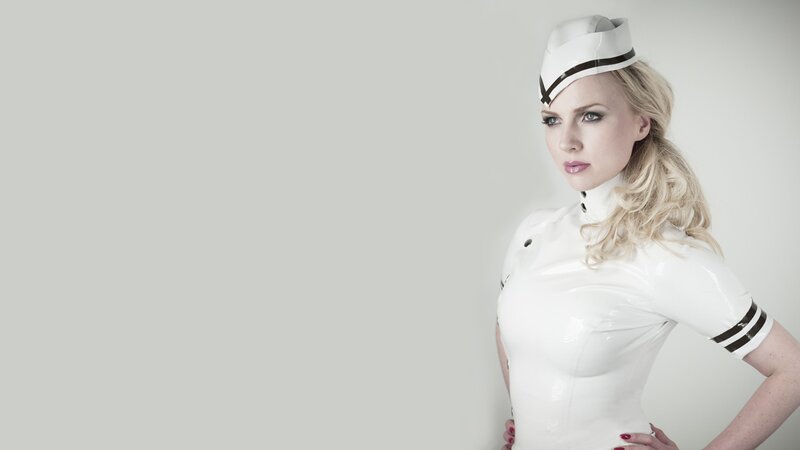 woman in white latex uniform