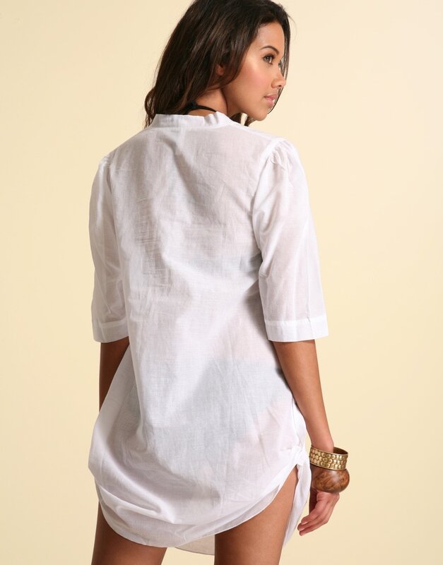 Woman in white linen shirt