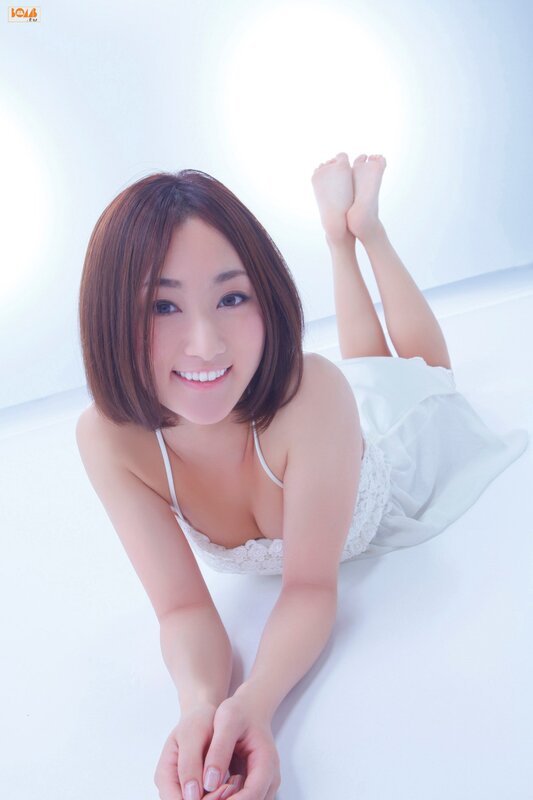 woman in white lingerie lying down