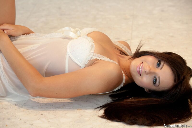 Woman in white lingerie lying down
