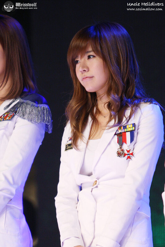 woman in white military-style jacket