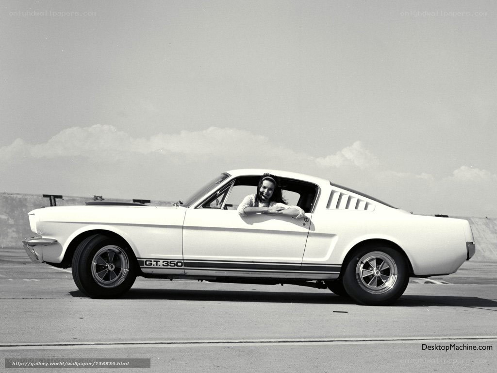 woman in white mustang car