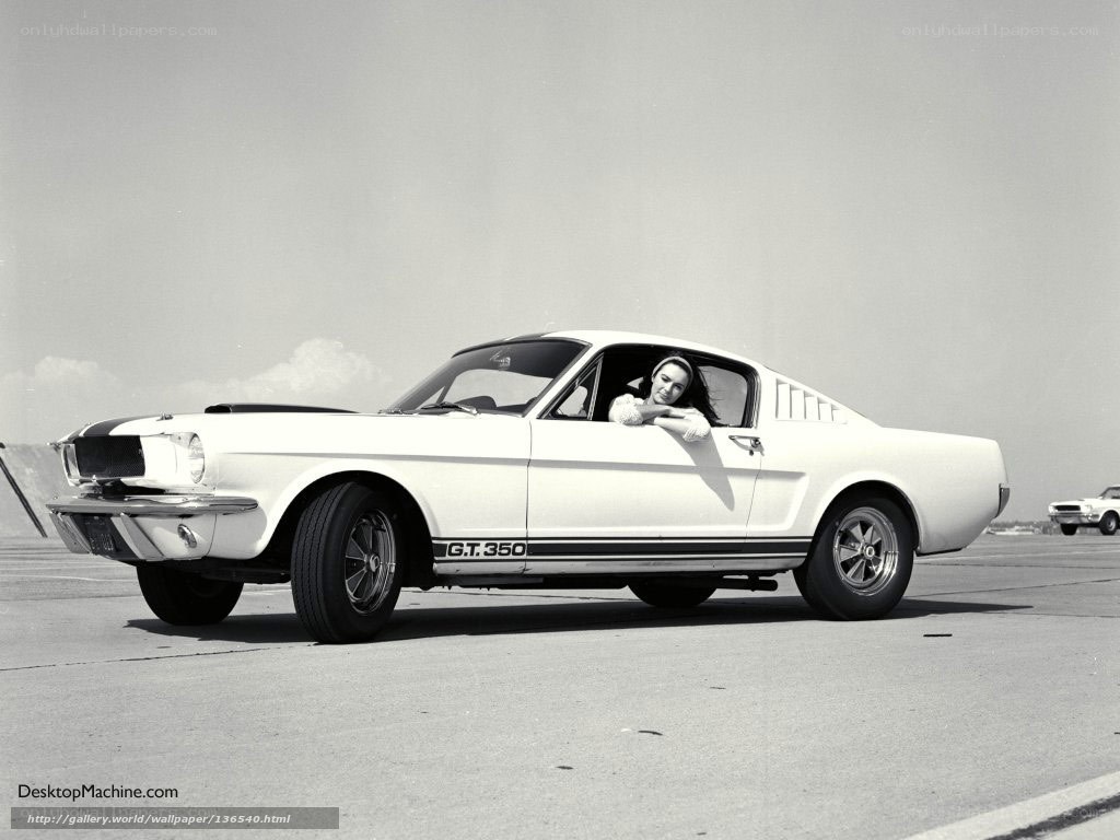 Woman in white Mustang