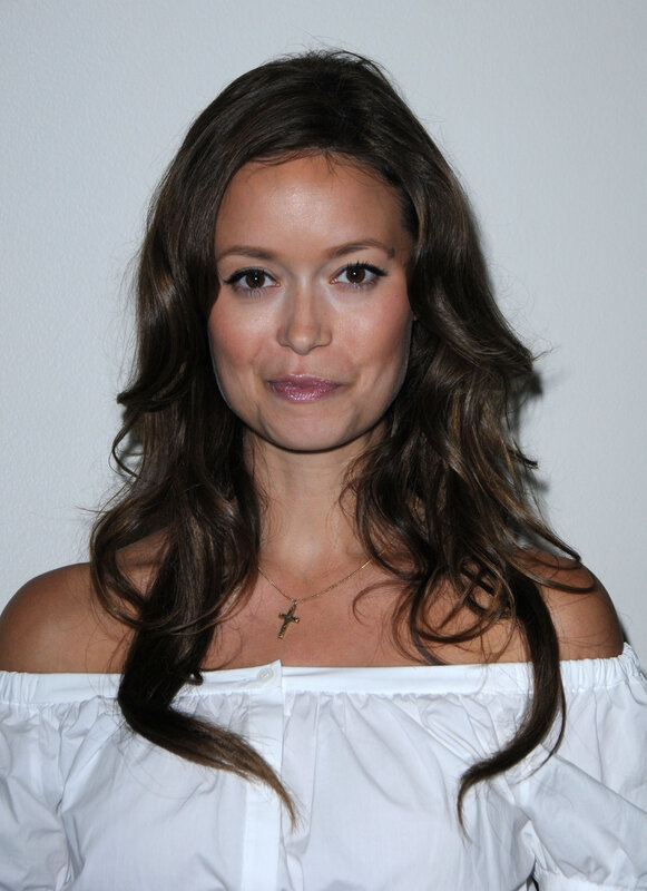 woman in white off-shoulder top