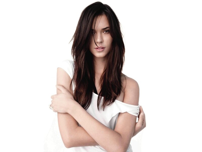 woman in white off-shoulder top