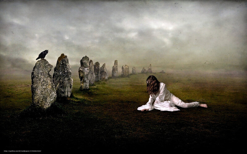 Woman in white on a misty field
