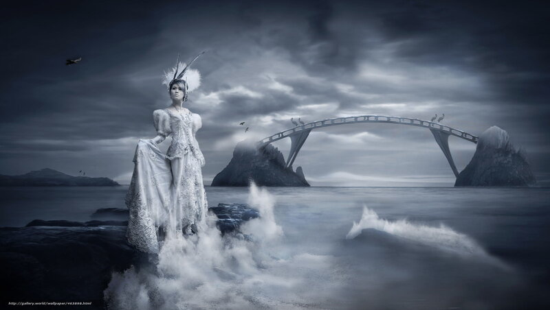 woman in white on rocky shore