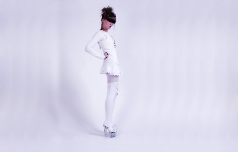 Woman in White Outfit — Dramatic, Photograph, Dress