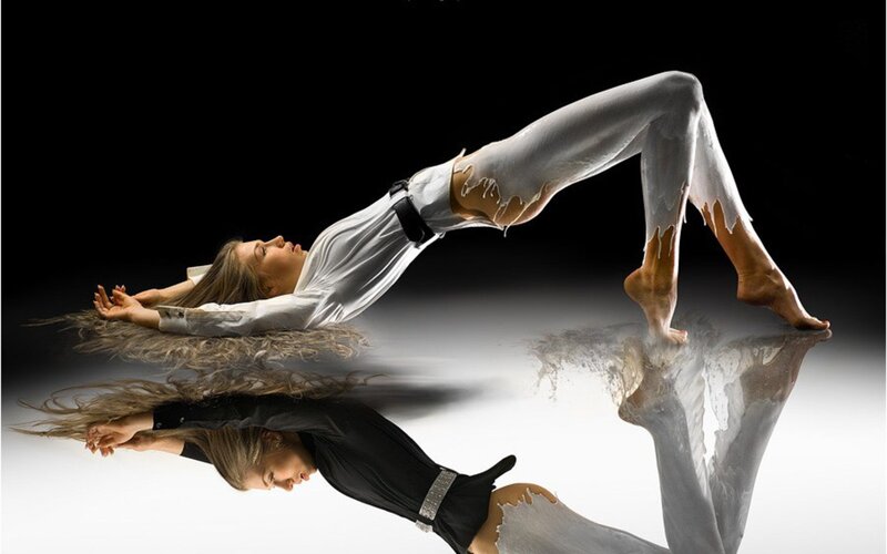 woman in white outfit performing dance
