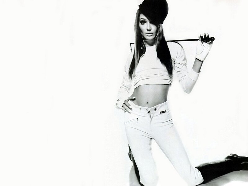 woman in white outfit posing