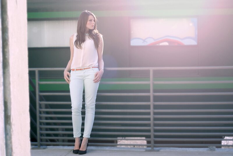 woman in white outfit standing