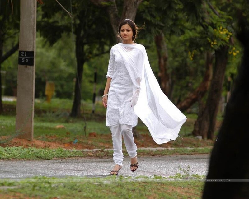woman in white outfit walking