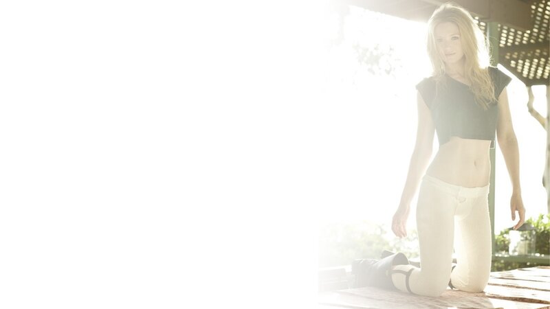 woman in white pants kneeling