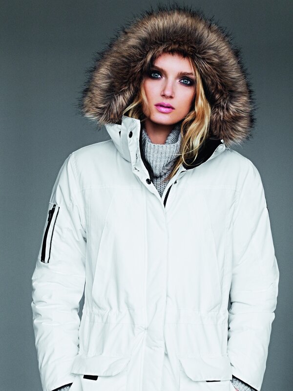 woman in white parka