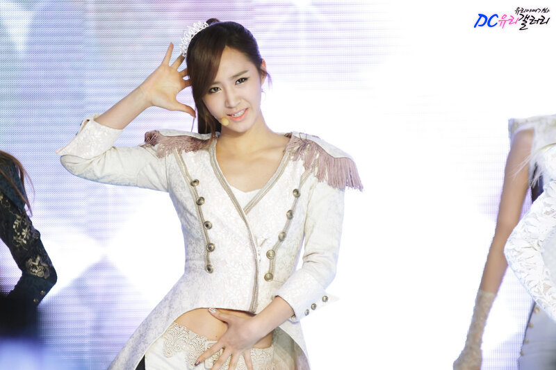 woman in white performance outfit