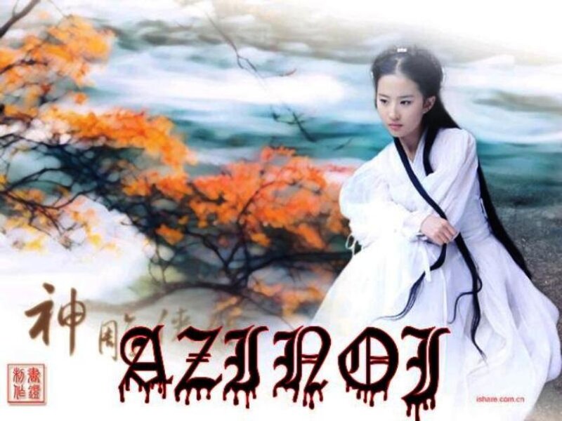 woman in white robe by autumn tree