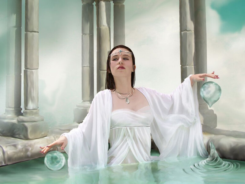 woman in white robe by water