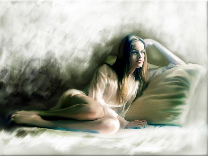 woman in white robe on bed