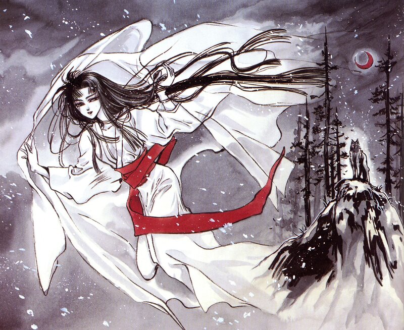 Woman in white robe on snowy mountain