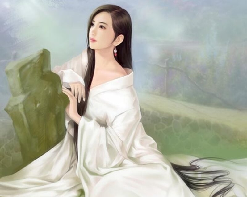 woman in white robe sitting