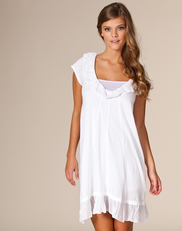 woman in white ruffled dress