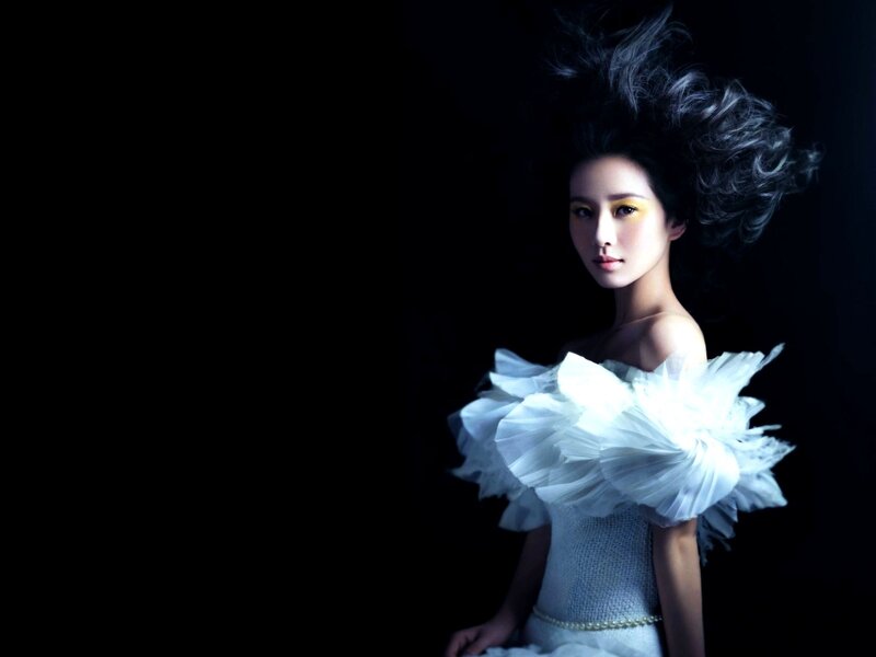 woman in white ruffled dress