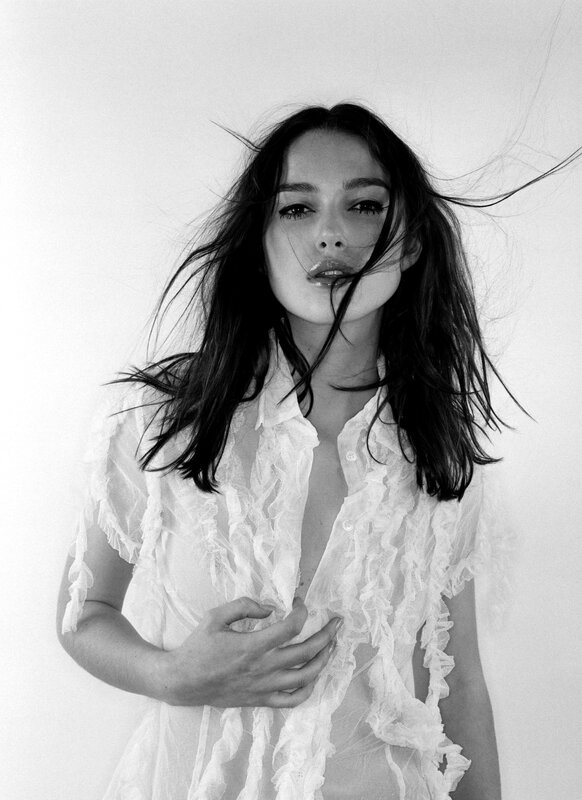 woman in white ruffled shirt