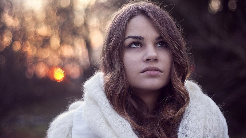 woman in white scarf outdoors