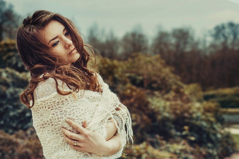 Woman in White Shawl — Contemplative