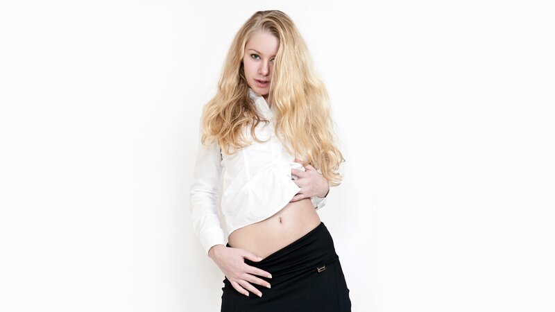 woman in white shirt and black skirt