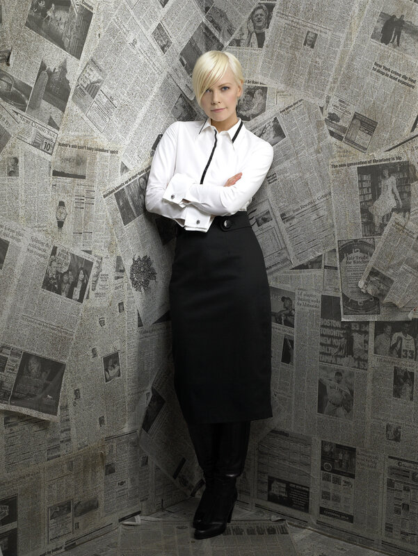 woman in white shirt and black skirt