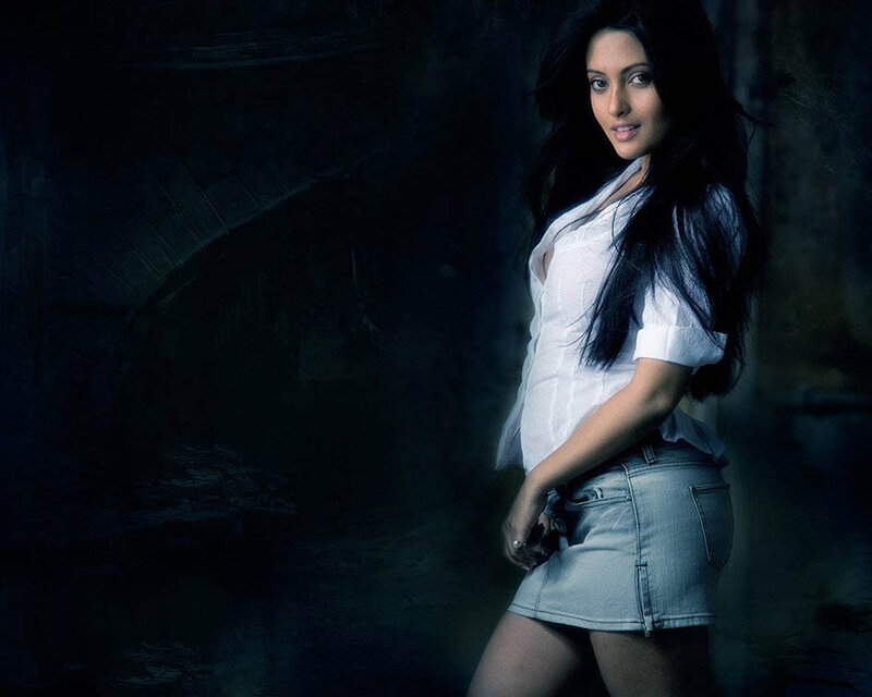 woman in white shirt and denim skirt