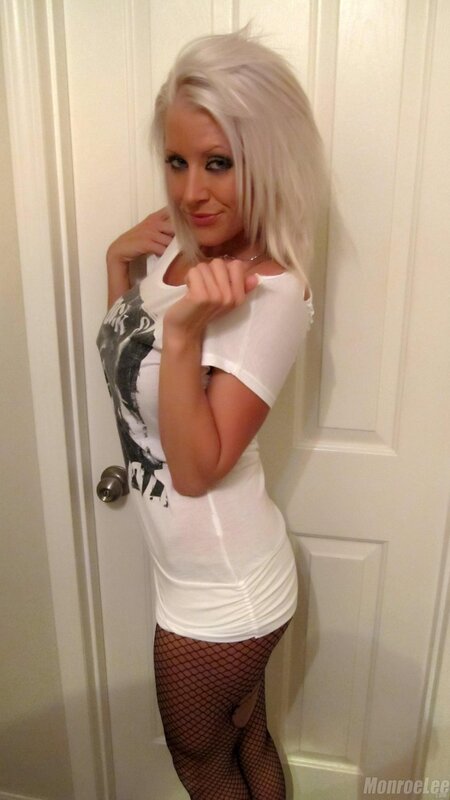woman in white shirt and fishnet stockings