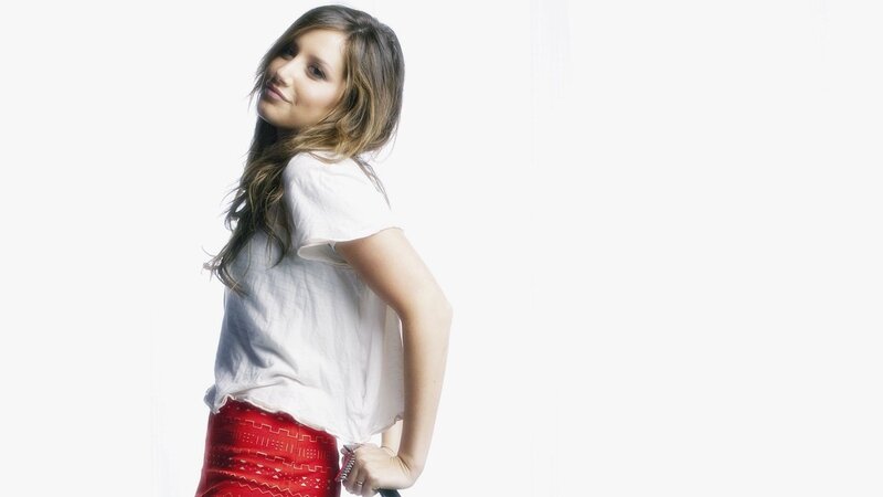 woman in white shirt and red skirt
